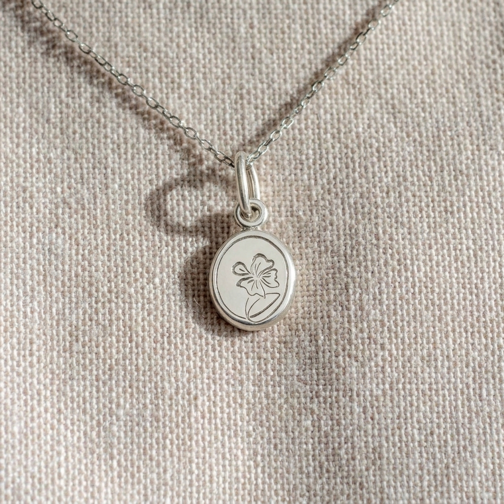 Posy Engraved Charm in sterling silver, hand engraved with a Pansy or violet flower