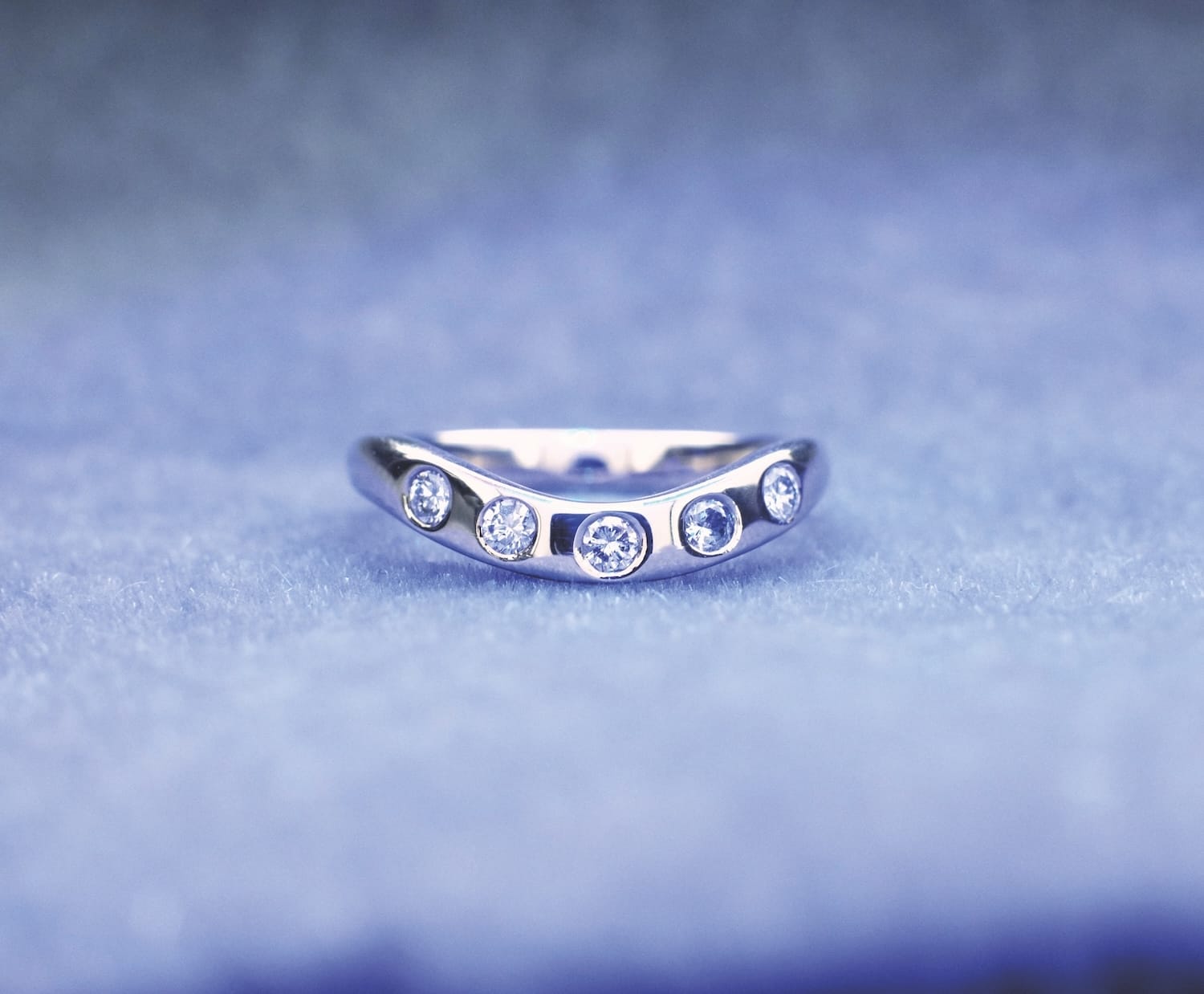 Lierin's curved wedding band set with five heirloom diamonds